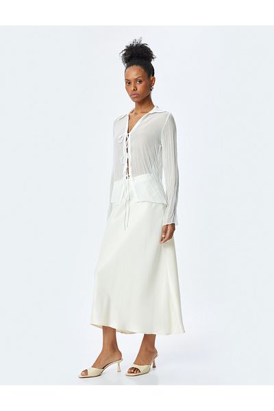 Koton Medium rise A form maxi satin skirt.