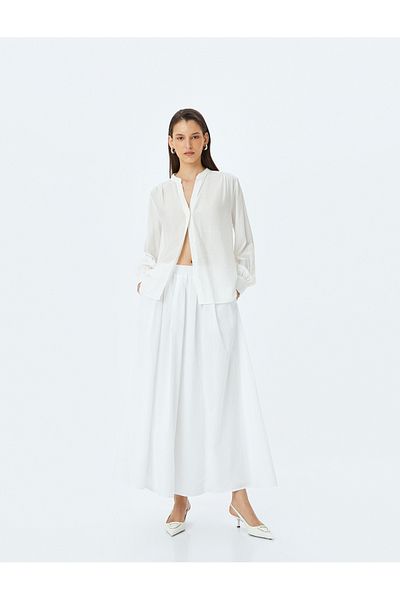 Koton Lined high rise maxi skirt with pockets.