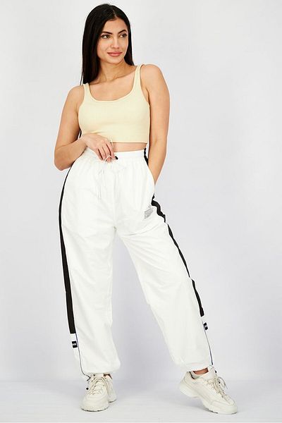 Puma Women Sportswear Fit Brand Logo Training Pant, White and Black
