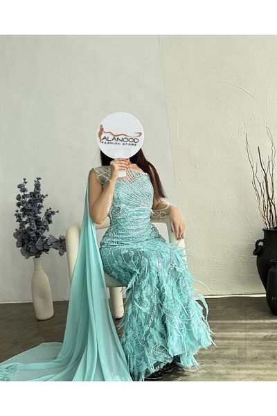 ALANOOD FASHION Luxurious turquoise evening dress decorated with elaborate embroidery