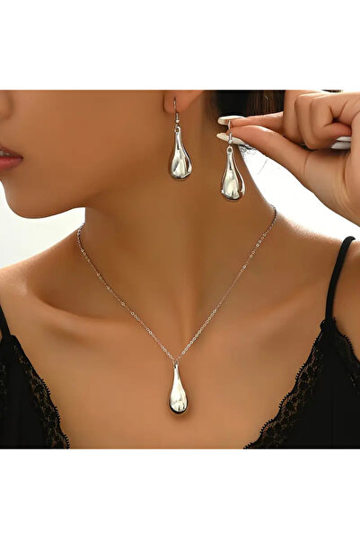 SEVAS GOLD طقم قلادة وأقراط على شكل قطرة باللون الأبيض للنساء