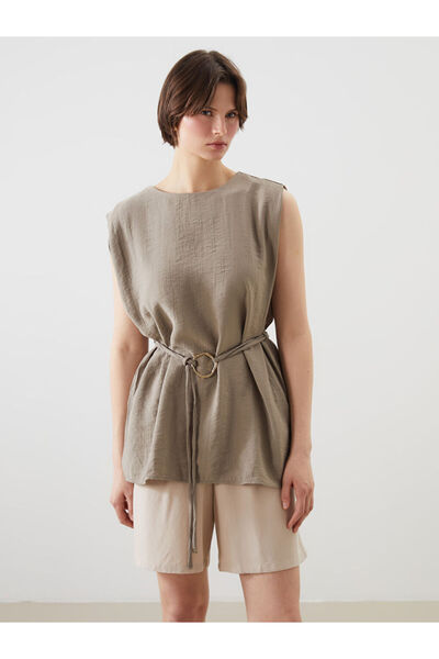 LC Waikiki بلوزة بحزام وياقة روبا جديدة تمامًا من UZG STORE لمحبي الأناقة