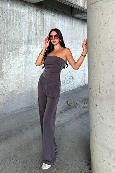 FEWTİNT Takım-Asimetrik kesim yırtmaç detaylı, büzgülü, straplez yaka top. Bel Elastik Bantlı Pantolon.