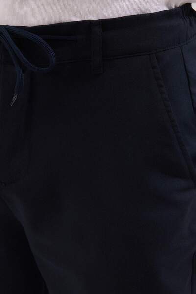 Trendyol Collection Темно-сині вузькі штани з еластичного тканого полотна TMNAW25PL00027