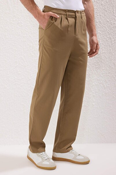 Trendyol Collection Béžové široké kalhoty Baggy Baggy z tkaniny TMNSS23PL00039