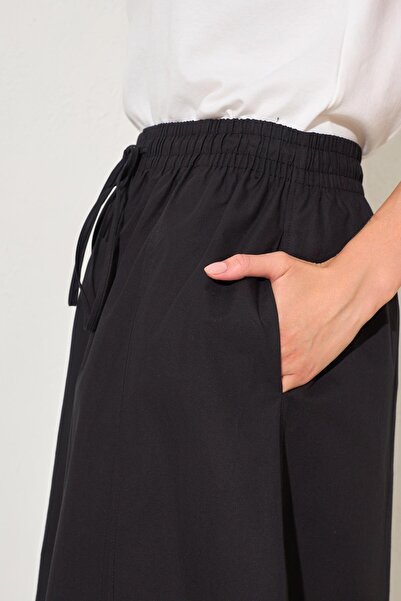 Setre Fusta neagră bumbac 100% confortabilă, lungime midi, cu talie elastică croială