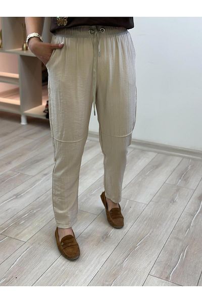 MELTEM TUĞAN Elastic waist linen trousers stone