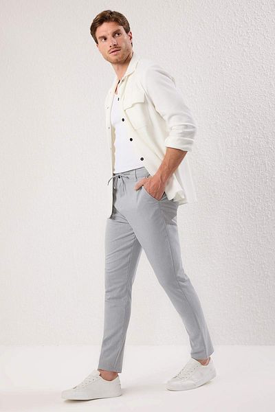 Trendyol Collection Ανοιχτό γκρι λεπτή εφαρμογή με δέσιμο στη μέση Λεπτομέρεια ελαστικό υφασμάτινο υφαντό παντελόνι TMNAW25PL00027