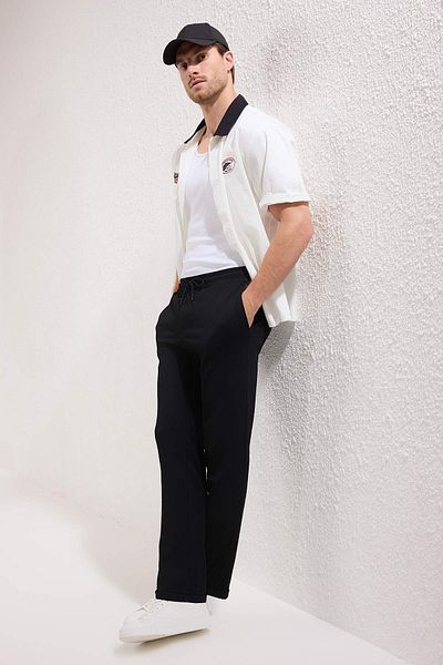 Trendyol Collection Black Regular Fit Knitted Flexible Comfortable Waist Tie Elastic Double Leg Pants Tmnaw25Pl00002