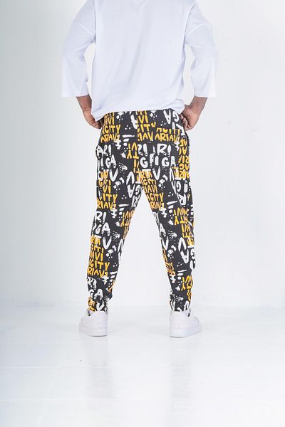COCOPELLI Yellow Graffiti Patterned Baguette Trousers