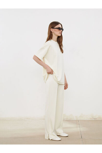 LC Waikiki Ecru Slim Fit Modal Blend Women's Pleated Trousers