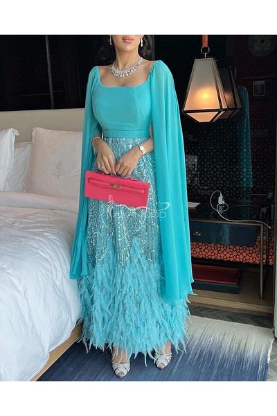 ALANOOD FASHION Sky blue chiffon and feather evening dress - Discover the splendor of elegance with Al Anoud Al Anzi