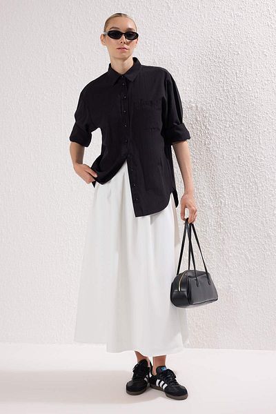Trendyol Modest Biała podszyta gładka tkana plisowana spódnica hidżabowa TCTSS25EE00020