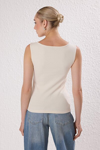 Trendyol Collection Stone Button Asymmetrical Fitted/Slim Fit Ribbed Stretch Knit Blouse Twoss25Bz00394