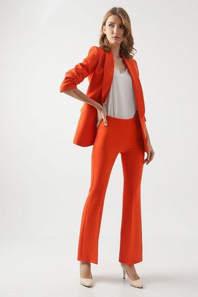 Swass - Flared Leg Orange Trousers