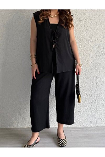 fatma keskin linna butik طقم مكون من قطعتين من سترة وسروال أسود للنساء