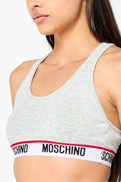 Moschino حمالة صدر رياضية غير مبطنة بشعار العلامة التجارية للنساء، باللون الرمادي