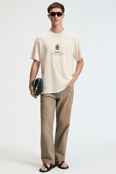 GRIMELANGE Bold men's 100% cotton Oversized fit Printed short sleeve round neck vanilla t-shirt