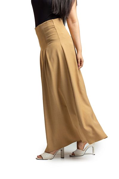 SUGA Ella's free skirt drapes confidently