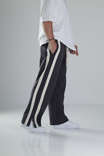 COCOPELLI Antracit színű melegítőnadrág csíkos hasítékkal