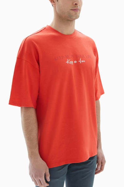 wecre8 Orange "Keep Me Alive" Printed T-shirt By WECRE8