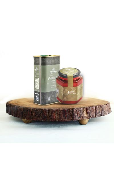 Nukhbat Aljawf Good Al-Jawf package (1 liter of oil + a quarter kilo of honey)