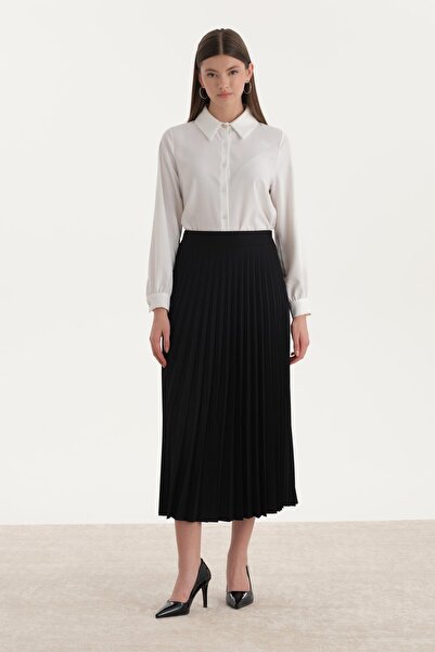 ipekton studio تنورة بليسول واسعة باللون الأسود