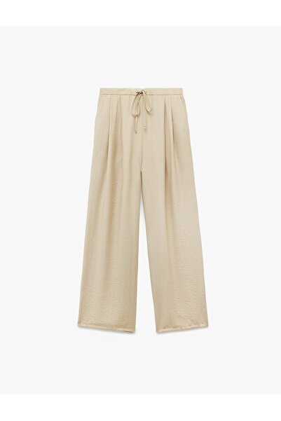 Koton Viskon Kumaş Beli Bağcıklı Pile Detaylı Cepli Geniş Paça Palazzo Pantolon