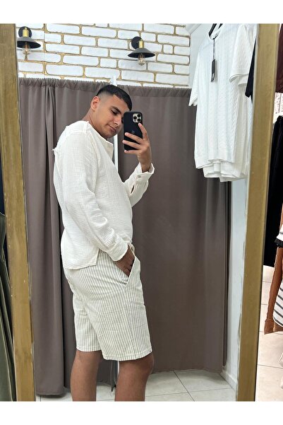 TUBA TOPTAŞ Striped linen shorts