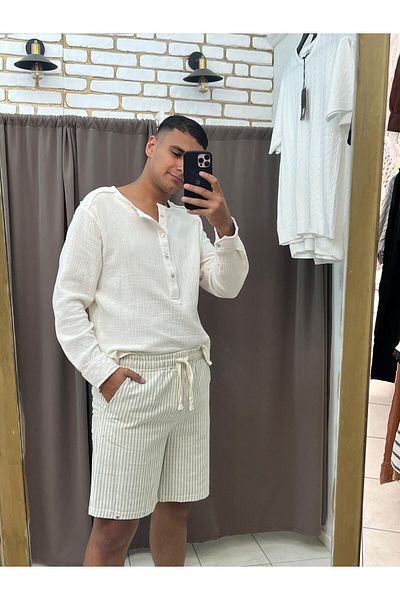 TUBA TOPTAŞ Striped linen shorts
