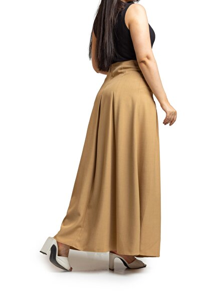 SUGA Ella's free skirt drapes confidently