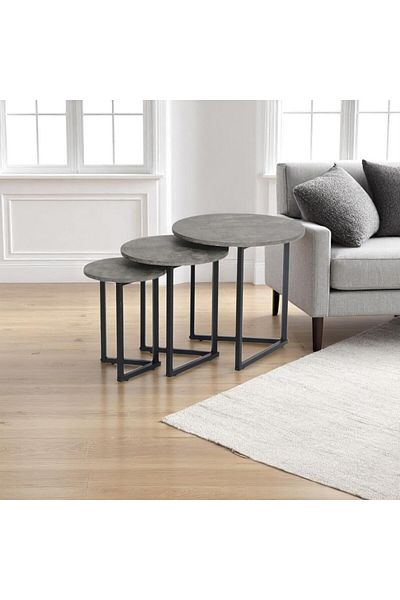 mr-everything A set of serving tables with an attractive, modern design, combining a concrete-like grey surface with a black metal frame.