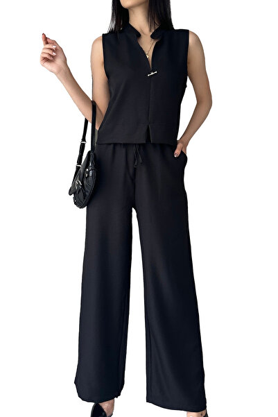 Caddebostan Moda بلوزة وسروال من قماش الكتان من Aerobin مع تفاصيل إكسسوارات ي...