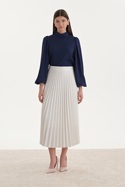 ipekton studio تنورة بليسول واسعة باللون الأبيض