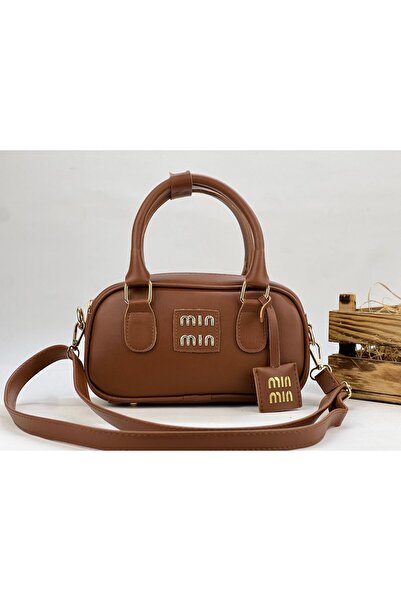 change time mın Kadın Yumuşak Yüzey Arma Detaylı Çapraz Kol Çantası Change Time Kalitesyle En: 23cm Boy:12cmDip:8cm