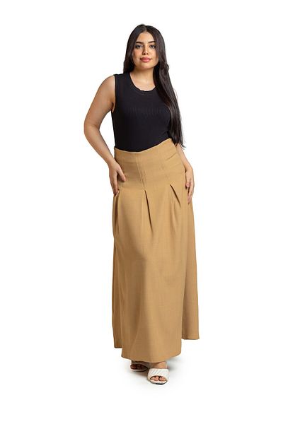 SUGA Ella's free skirt drapes confidently