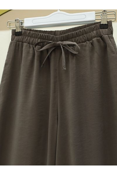 Modamorfo Loose Trousers with Elastic Waist and Lace-Up Wide Legs - Camouflage