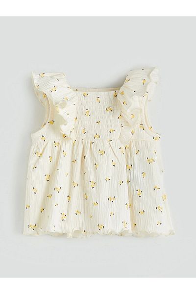 LC Waikiki بلوزة وبنطال ضيق للفتيات الصغيرات من LCW Baby Ecru Floral مكون من قطعتين