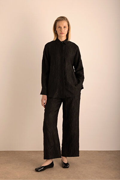 Aker Pantaloni de in cu efect de craș