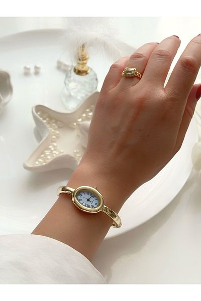 Forsining -(Gold Color) Blue Inner Dial Handcuff Model Women's Wrist Watch