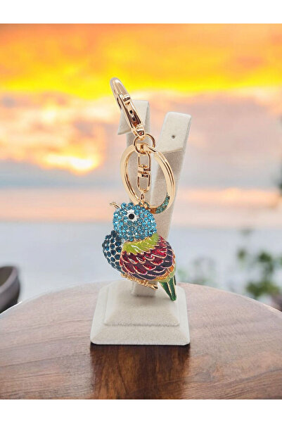 Tokkal 🐦   "أجنحة ملونة" سلسلة مفاتيح على شكل طائر من الزركون وحقيبة ساحرة