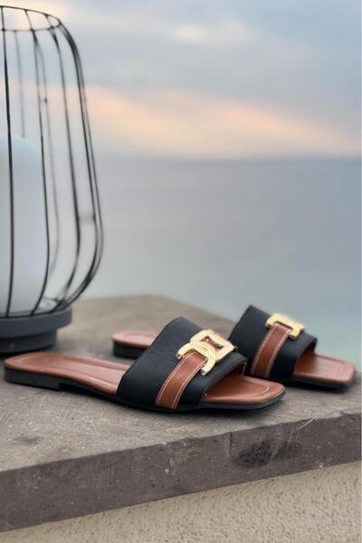 Melissa Boutique شبشب صيفي نسائي ذو نعل ناعم ومزين بإبزيم ذهبي أسود