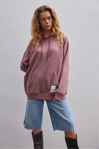 bases. Oversized Hooded Sweatshirt with Faded Effect and Fleece Inside
