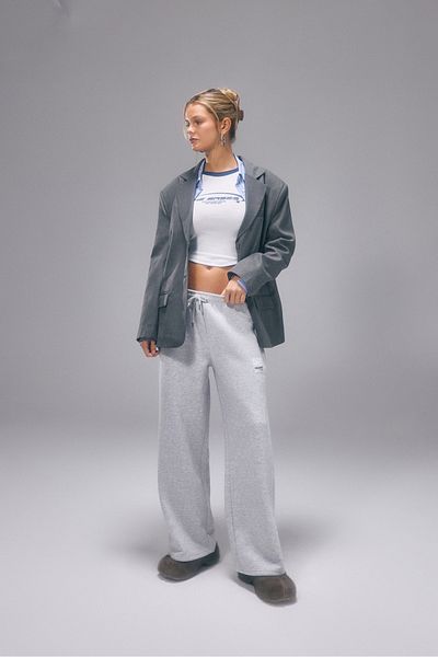bases. Pantaloni de sport de damă cu fleece în interior și dungi laterale