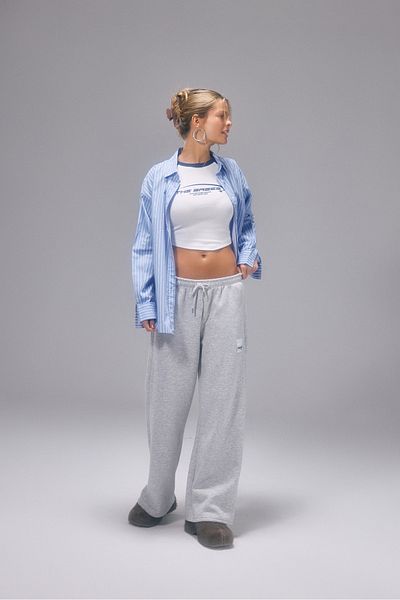 bases. Pantaloni de sport de damă cu fleece în interior și dungi laterale