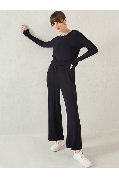 Femmella By Styli Black Smocked Waistband Flared Knit Pants