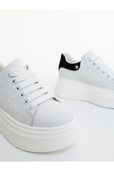 Kalapod Women's white and black sports shoes made of genuine leather Revena