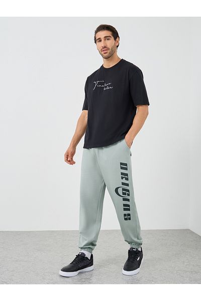 Styli Textured Slogan Print Oversized Joggers