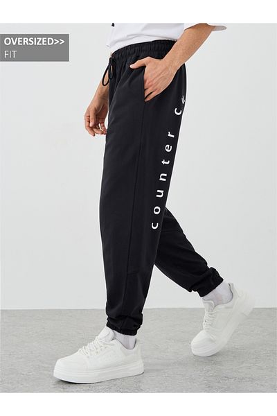 Styli Slogan Print Oversized Joggers with Drawstring