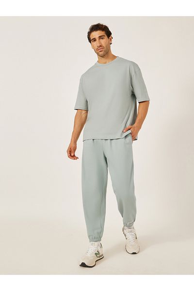 Styli Mid Rise Relaxed Fit Joggers with Badge Detail